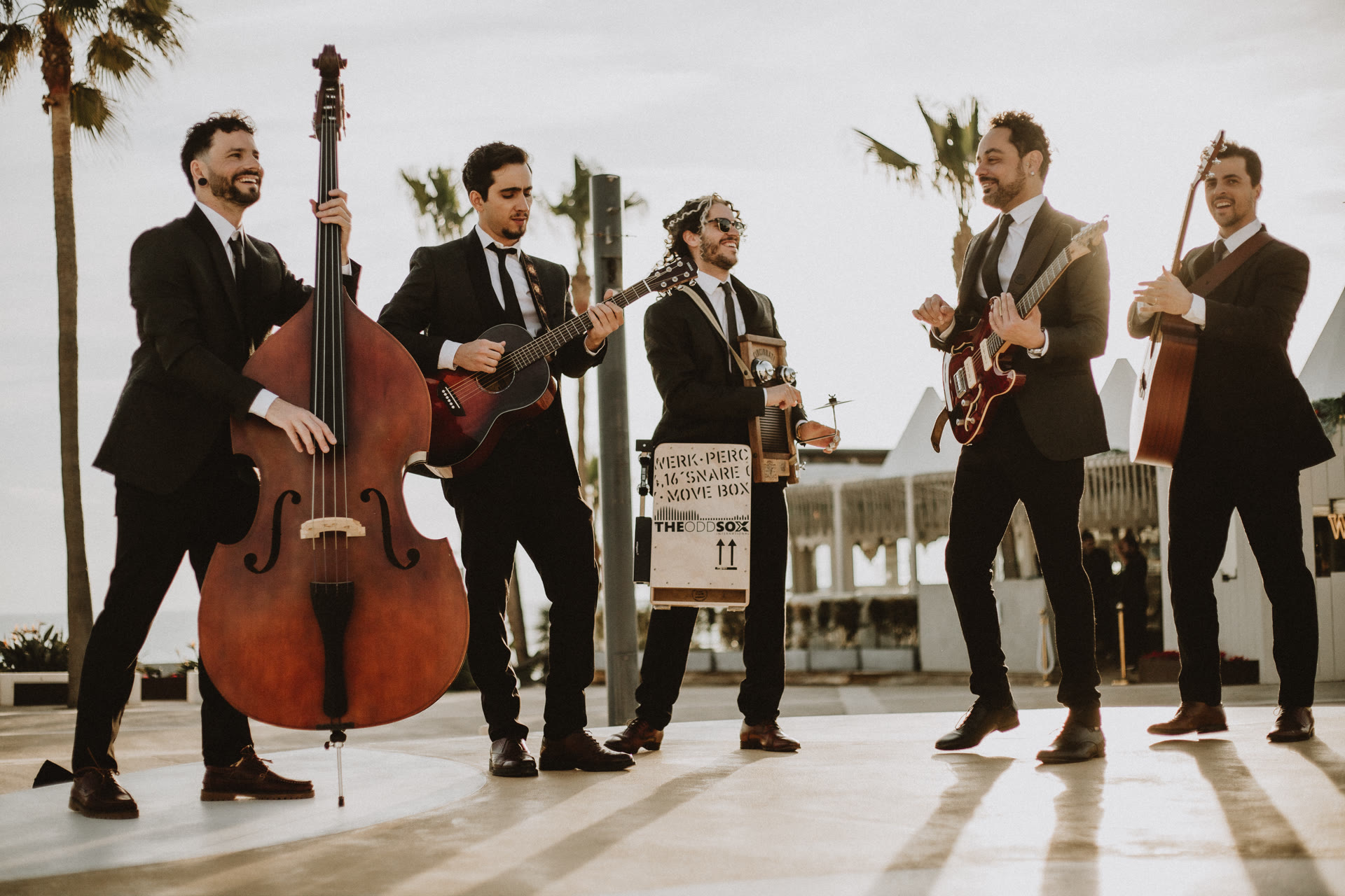 The Odd Sox International roaming band performing acoustically among wedding guests